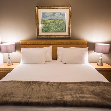אידנווייל Airport Inn And Suites מראה חיצוני תמונה