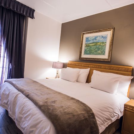אידנווייל Airport Inn And Suites מראה חיצוני תמונה
