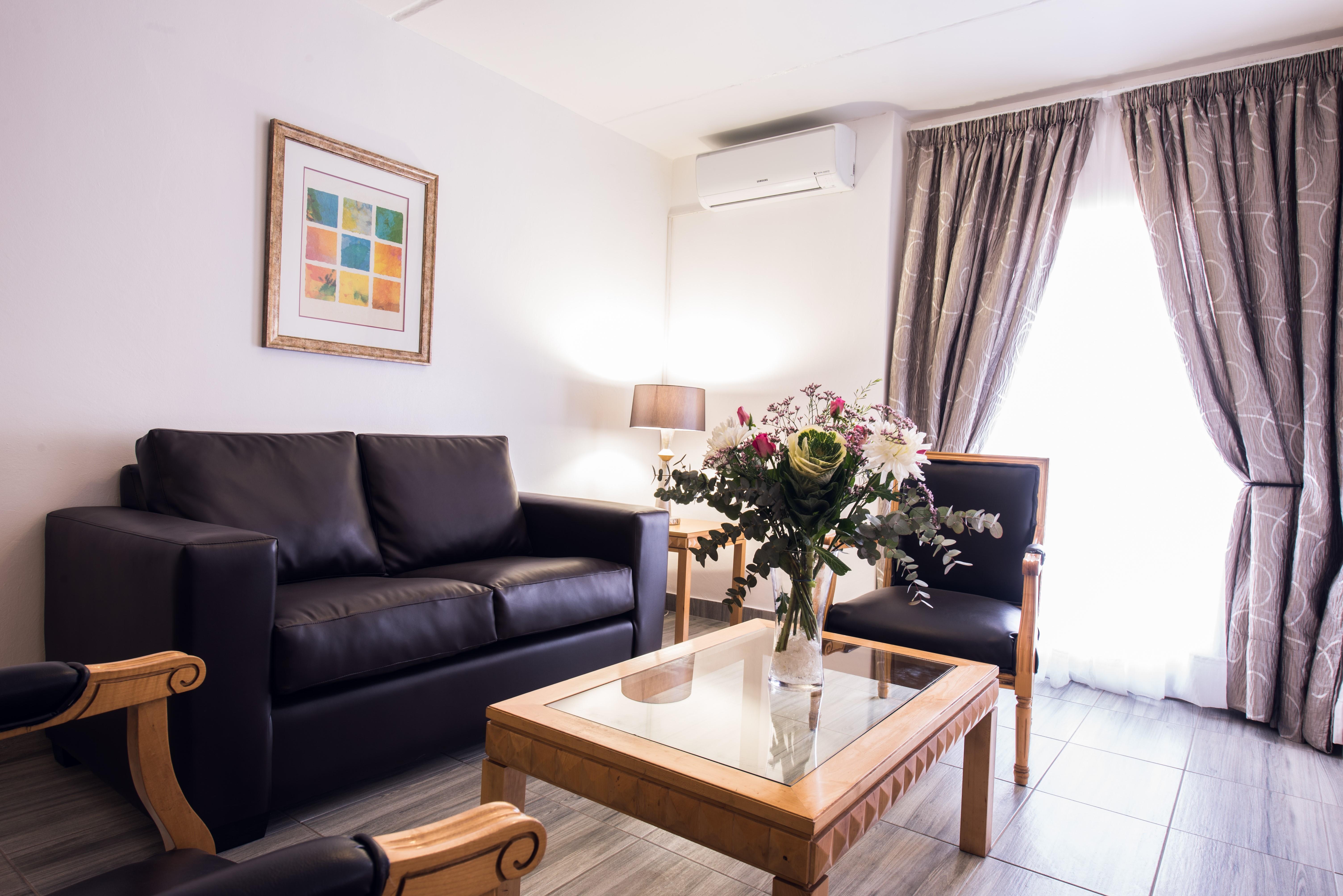 אידנווייל Airport Inn And Suites מראה חיצוני תמונה