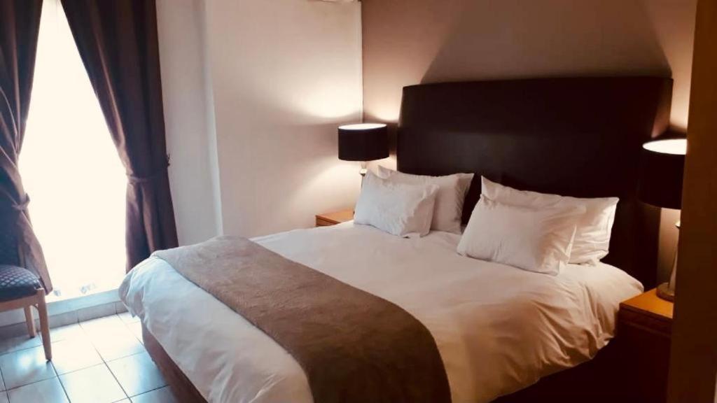 אידנווייל Airport Inn And Suites מראה חיצוני תמונה